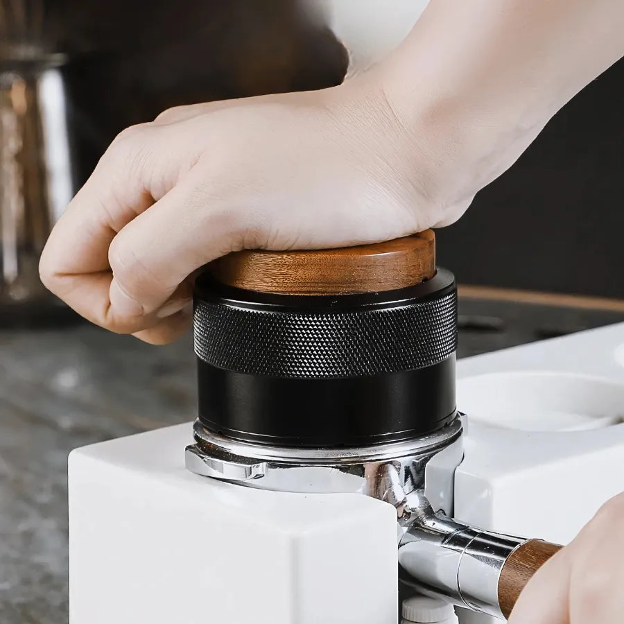 Tamper calibré à ressors intégré