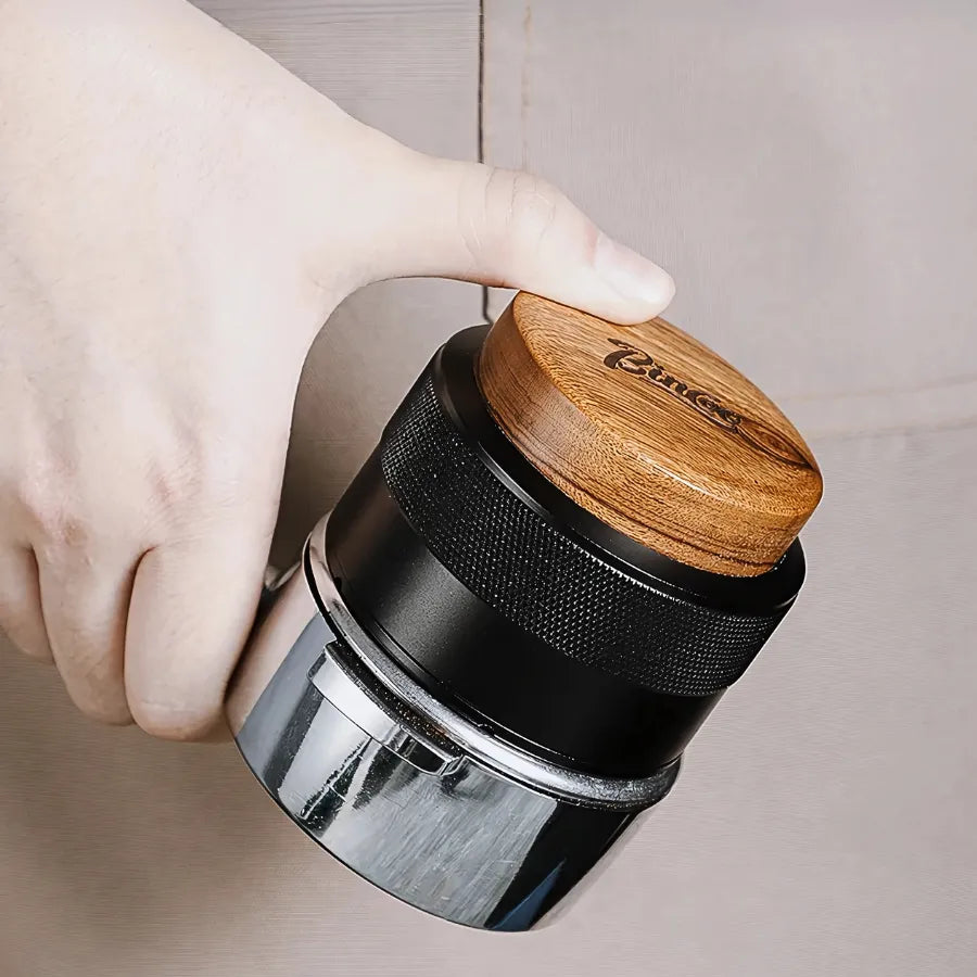 Tamper calibré à ressors intégré