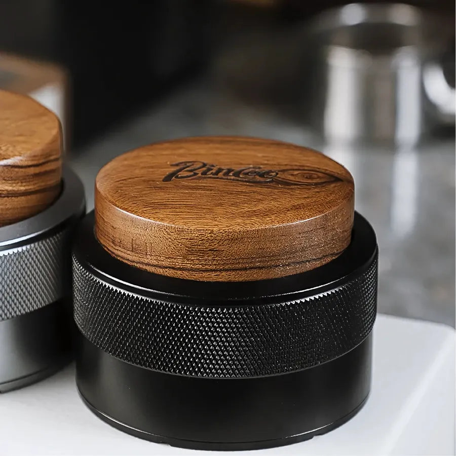 Tamper calibré à ressors intégré